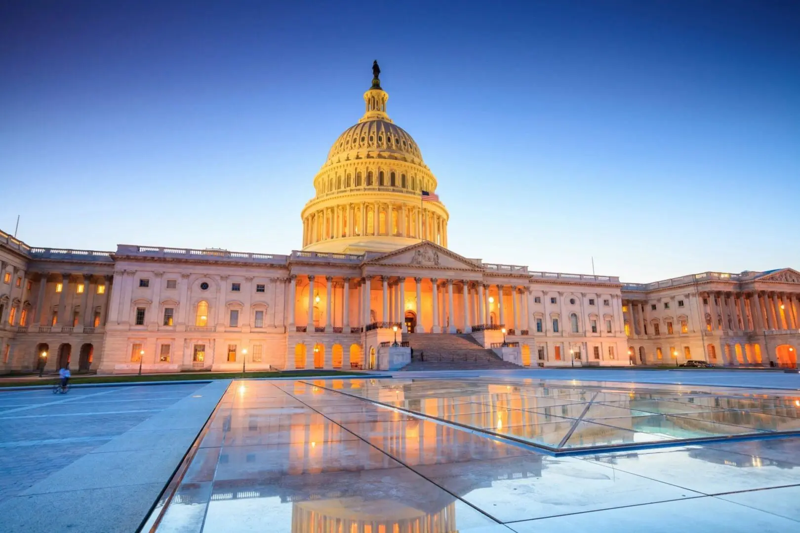 A building with the capitol in the background.